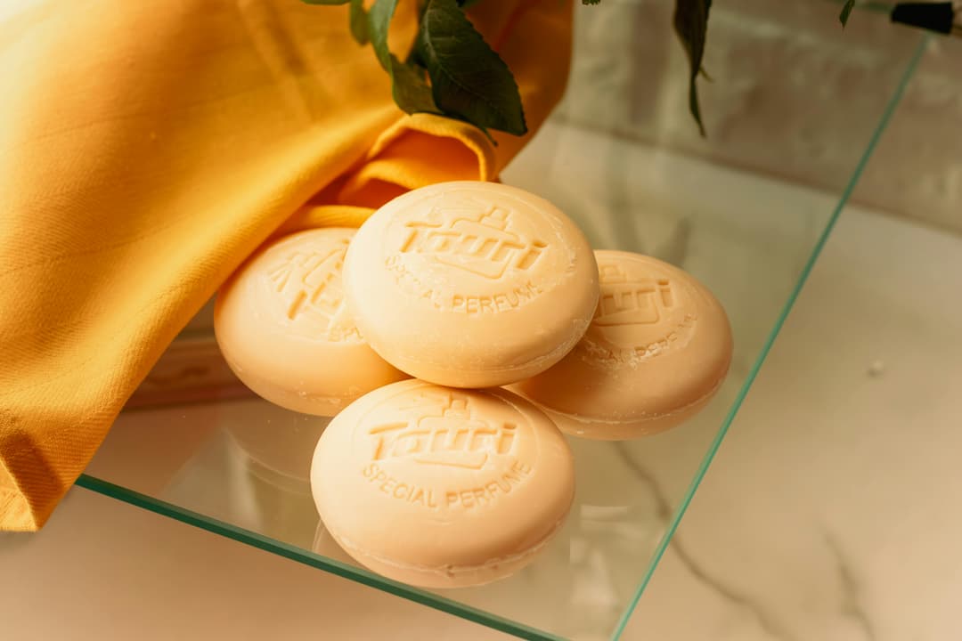 Cold process soap bars showing golden color from calendula-infused olive oil