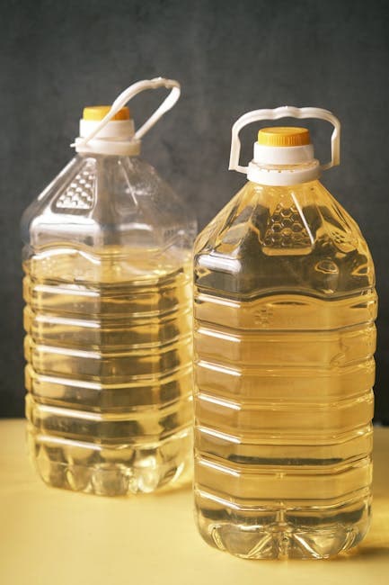 Natural oil being poured for a soap recipe