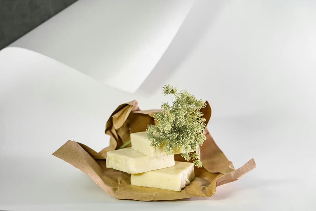 Wrapped handmade soap bars ready for storage or sale