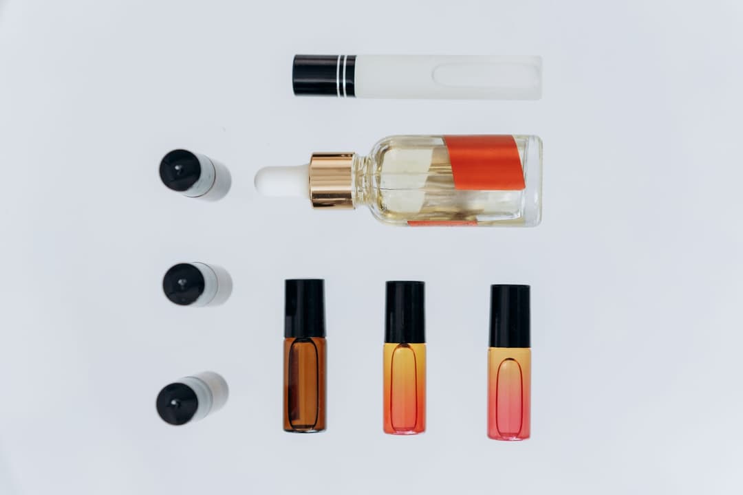 Fragrance oils lined up for soap making with different scent profiles