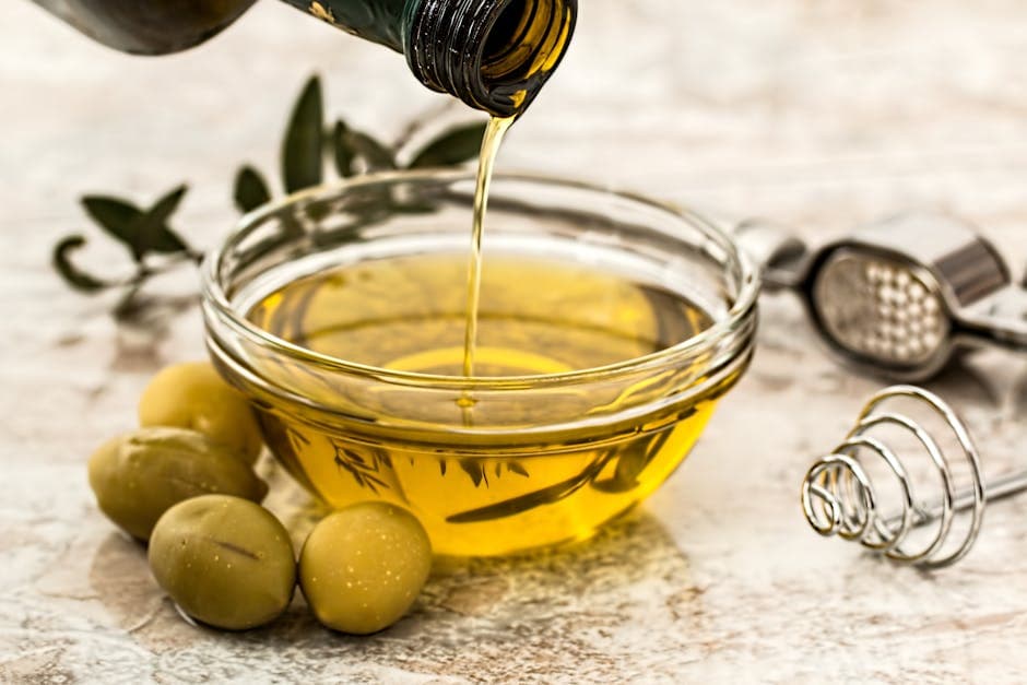 Olive oil being poured for castile soap