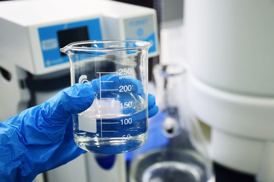 Distilled water measured in a beaker for testing