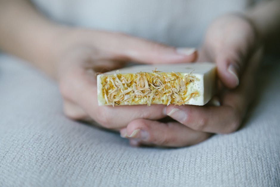 Golden calendula soap bar with dried petals on top