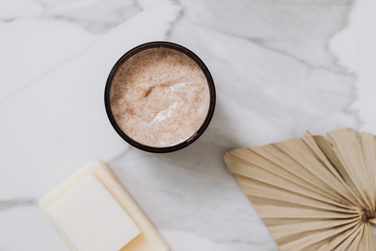 Natural soap ingredients and handmade scrub bar with exfoliating texture
