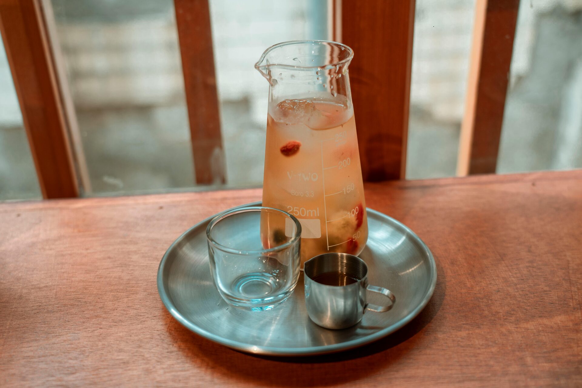 Lye solution in a pitcher with a thermometer
