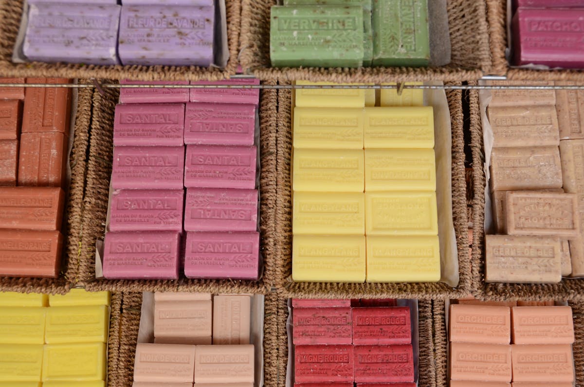 Colorful soap bars displayed at a market showing mica color possibilities