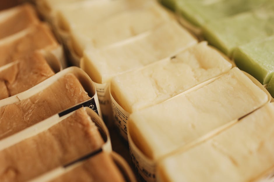 Natural soap bars arranged on a curing rack during the curing process