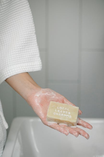 Natural shampoo bar being used with water and lather