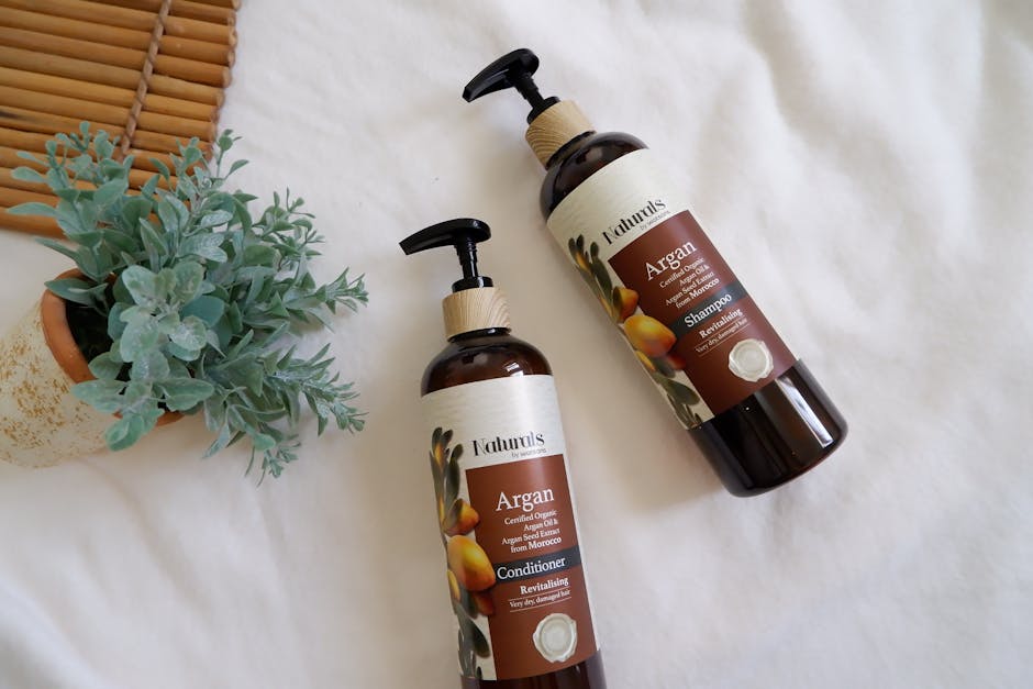 Natural shampoo and conditioner bottles with essential oil ingredients