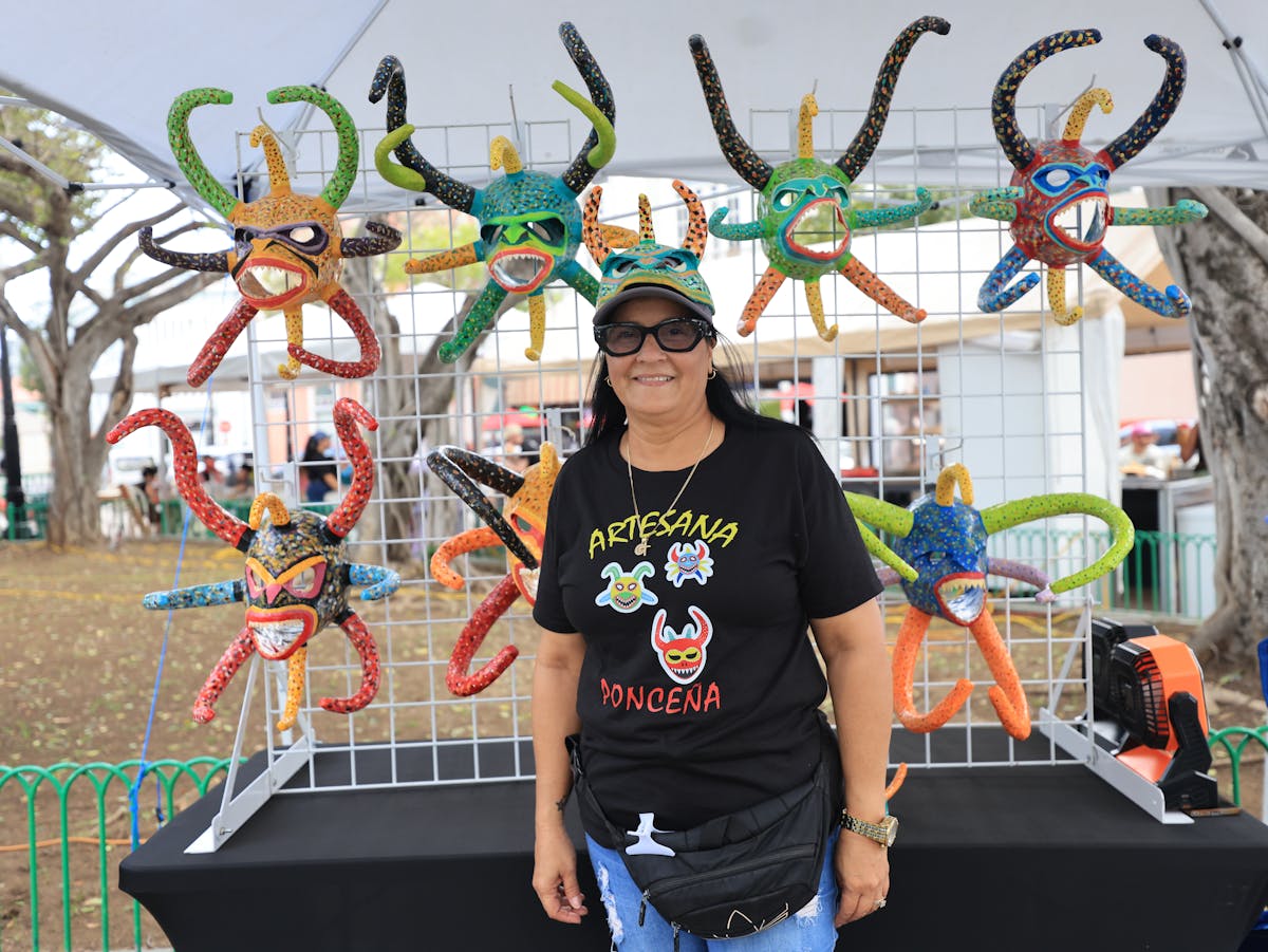 Craft fair booth displaying handmade soap products for sale