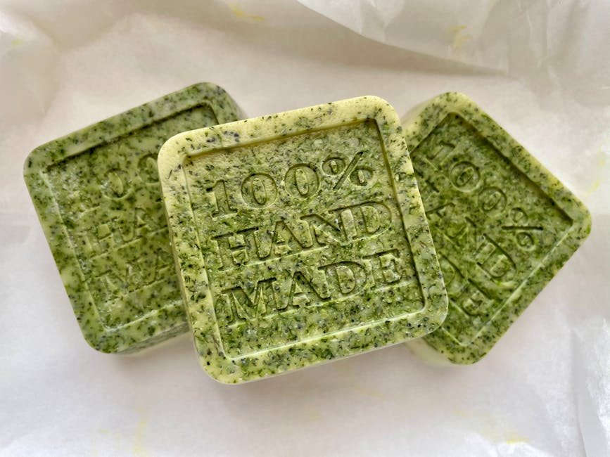 Collection of handmade green soap bars with natural ingredients